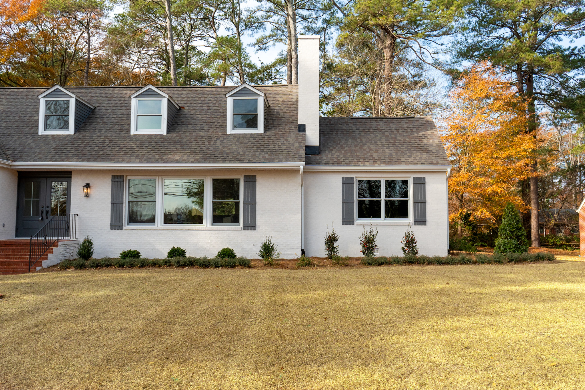 White Cape Cod in fall.