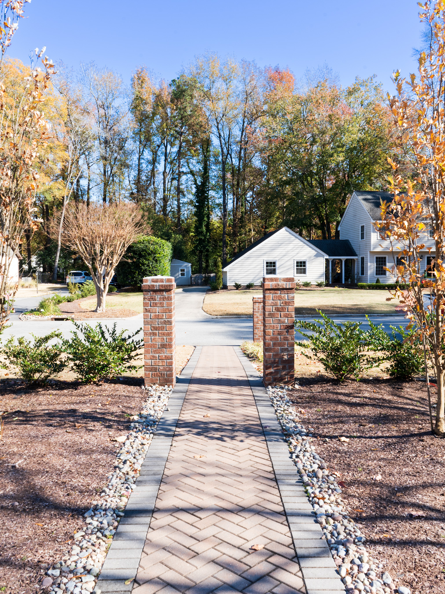 Detail of brick coursework and stone-cap finish.