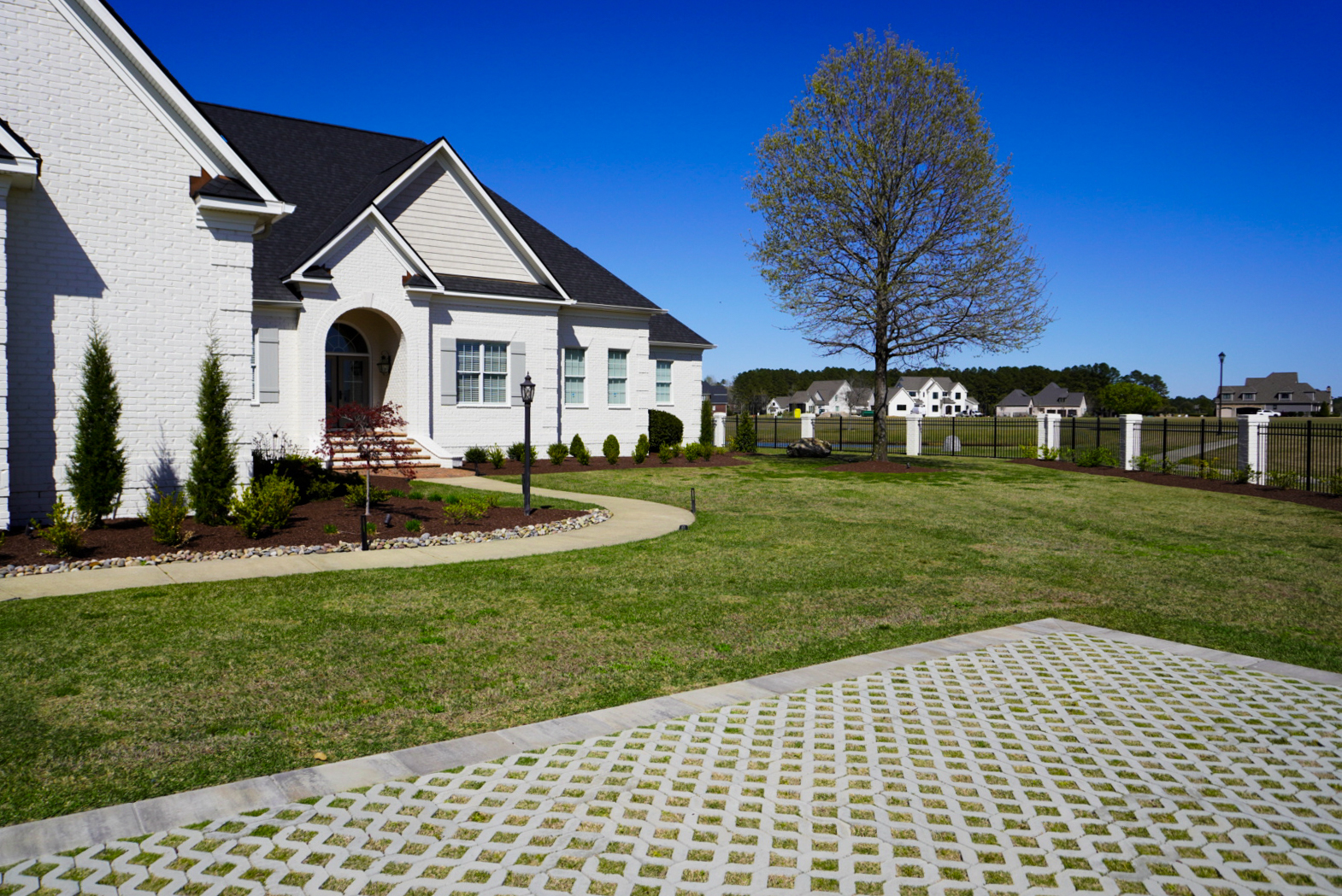Grass-paver circular driveway.